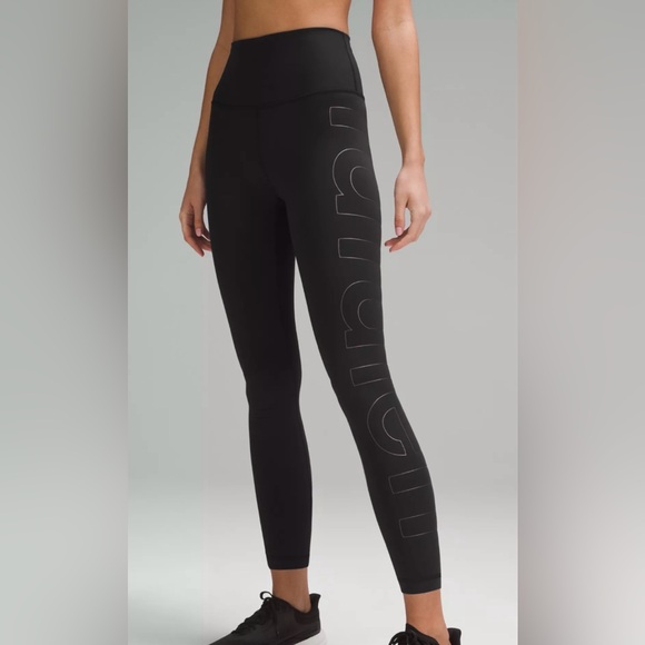 Wunder Train High-Rise Tight 25” Graphic. New Without Tags. Black/Iridescent